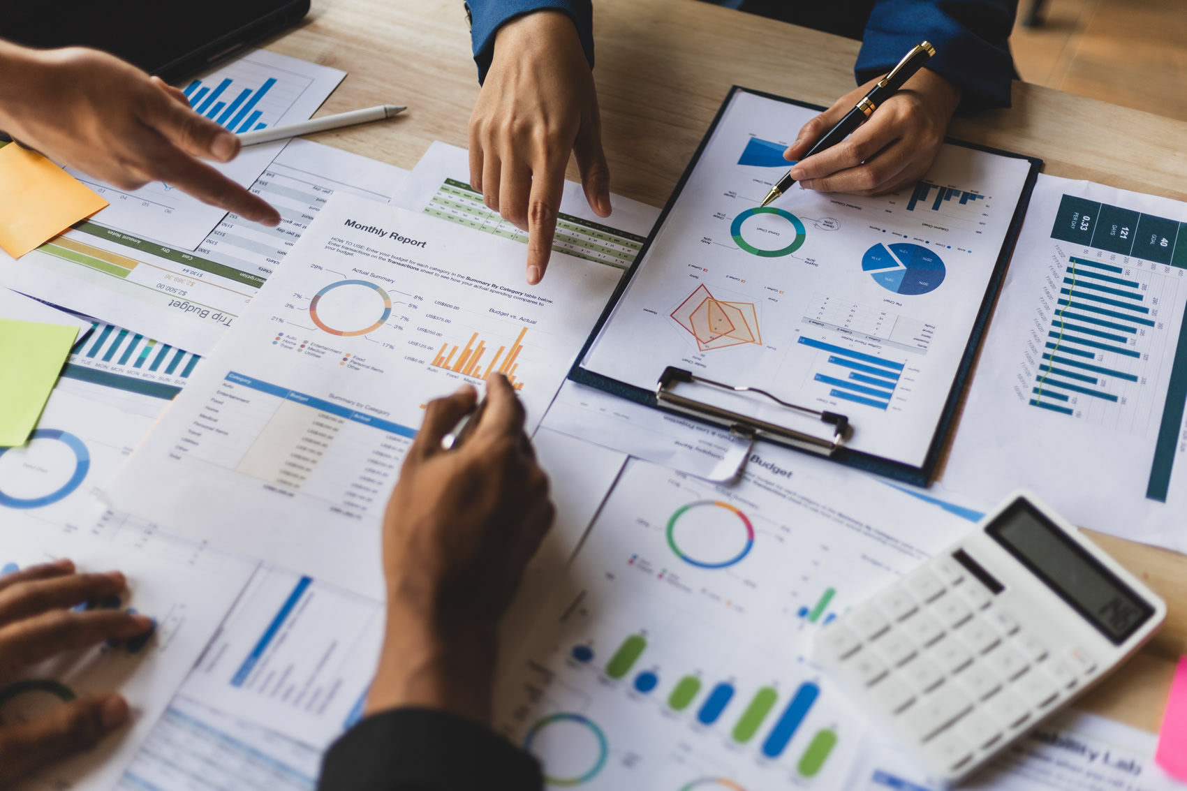 Business meeting, Financial consultants discuss investment growth chart analysis in company financial reports and are planning marketing business